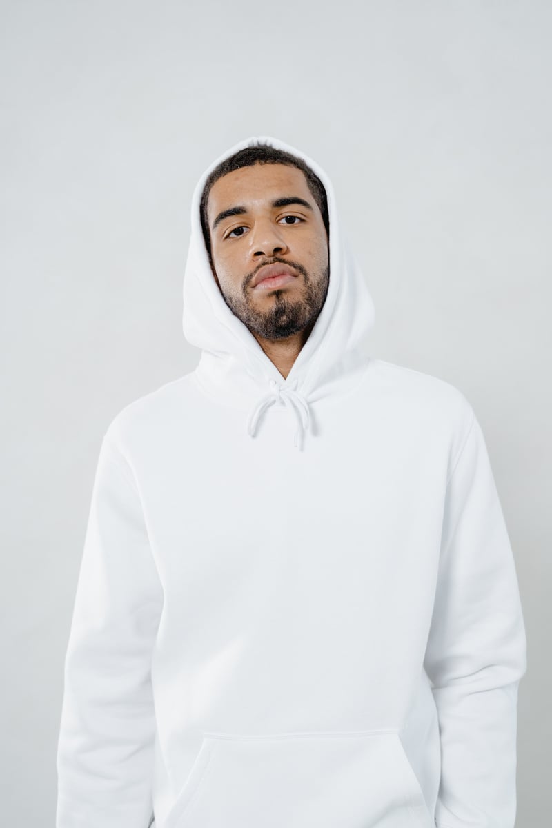 A Bearded Man in White Hoodie